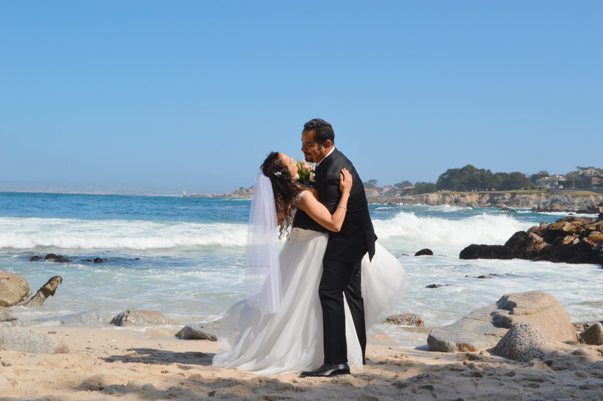 lovers point embracing on the beach