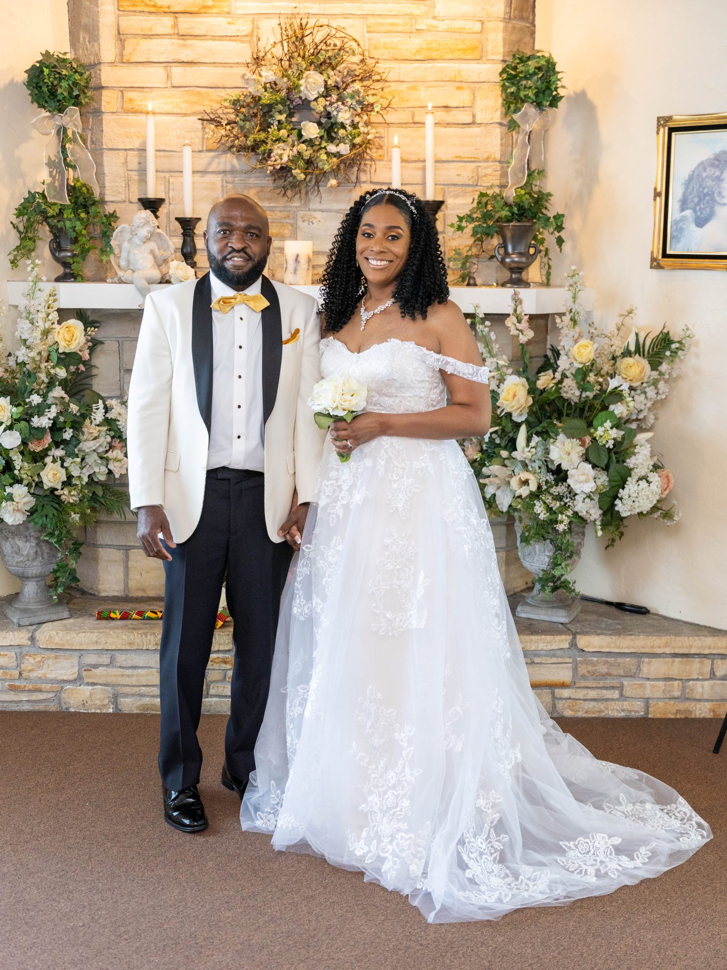 stone chapel beautiful couple and flowers at the hearth